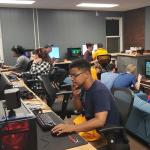 Gamers try out the college’s gaming and e-Sports space in Whitney Hall during the Student Involvement Fair.