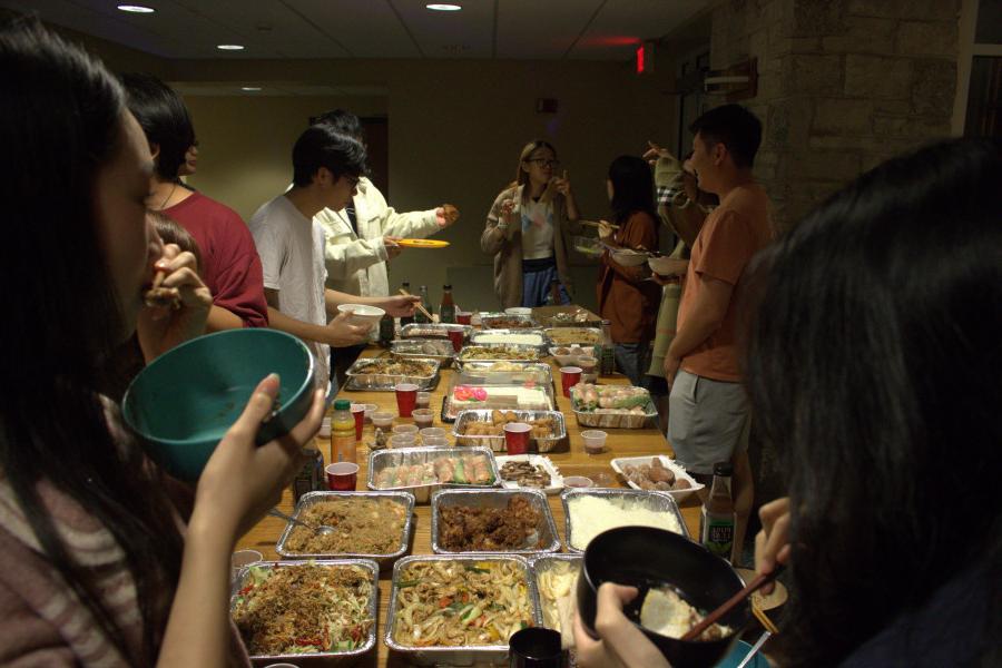 Members of the Vietnamese Student Association share a dinner together in Maurer Link.